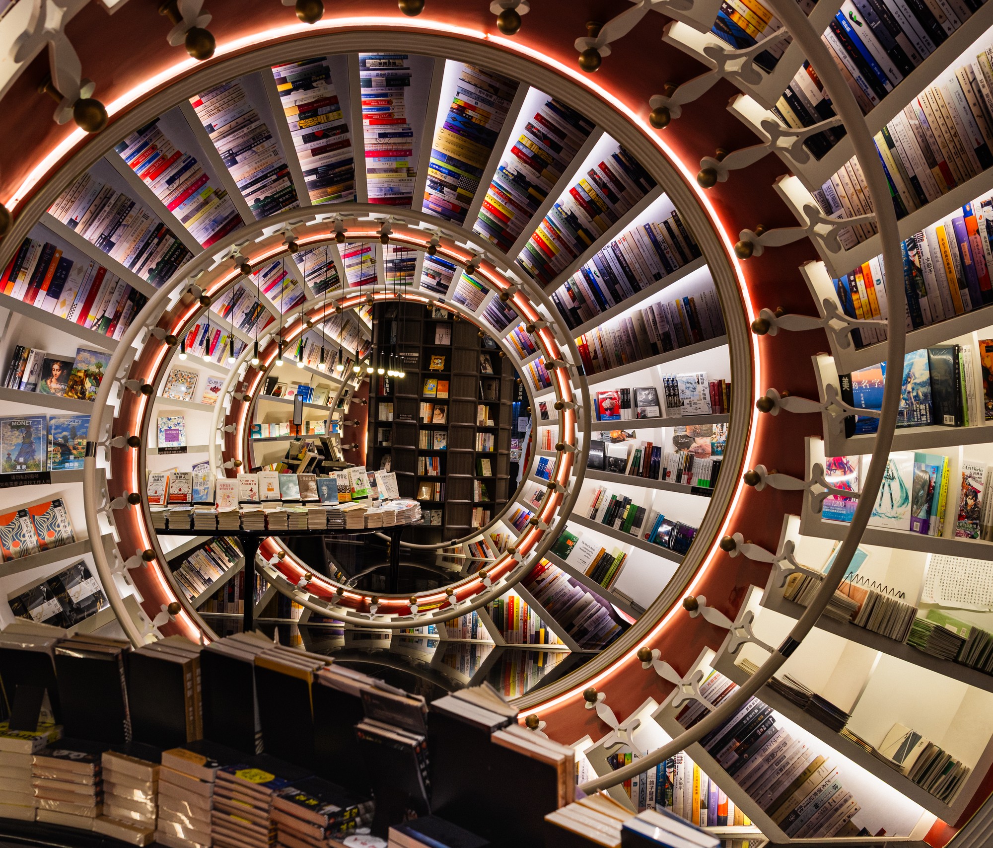 A dizzying spiral of bookshelves in a modern bookstore, China